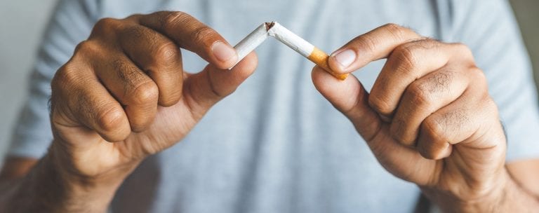 Break down cigarette Quitting from addiction concept