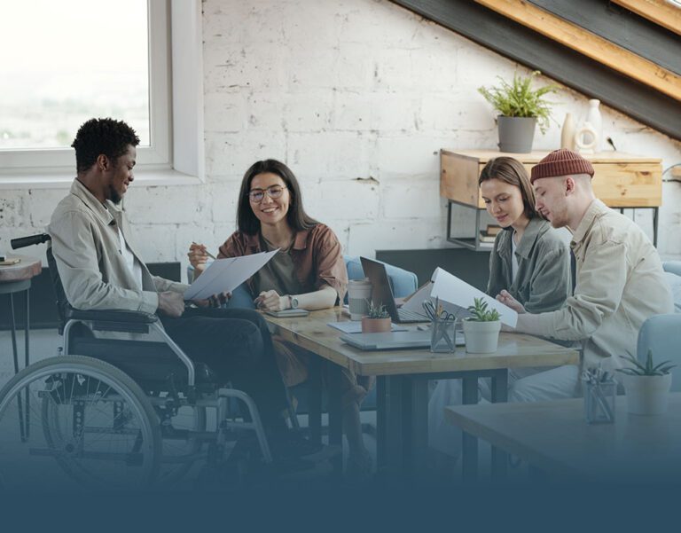 coworkers celebrating international day of persons with disabilities