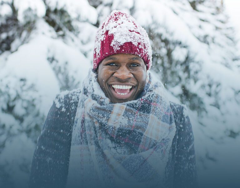 smiling man learns new year's goals to empower your mental wellness journey