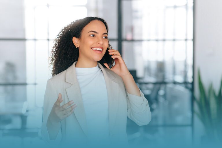 woman on phone discusses 10 effective tips to boost mental health at work for greater productivity