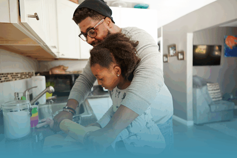 a father and daughter bake cookies together in their home kitchen as a way to unlock creative potential.