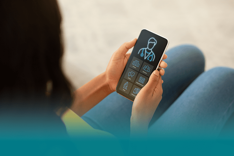 woman holds phone looking at app that helps her when managing family health records digitally