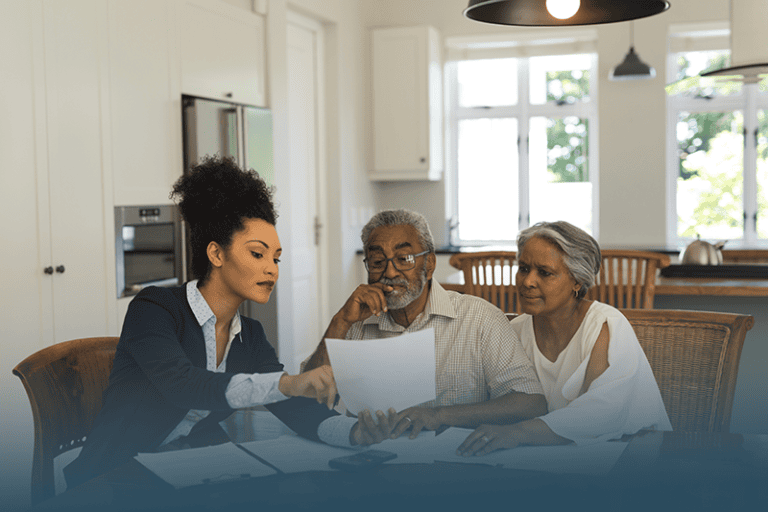 Employee caring for aging loved ones who is dealing with the elder support gap takes time out of her day to help her parents.
